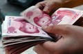 China fija por primera vez desde 2008 el cambio de su moneda por encima de los 7 yuanes por dólar