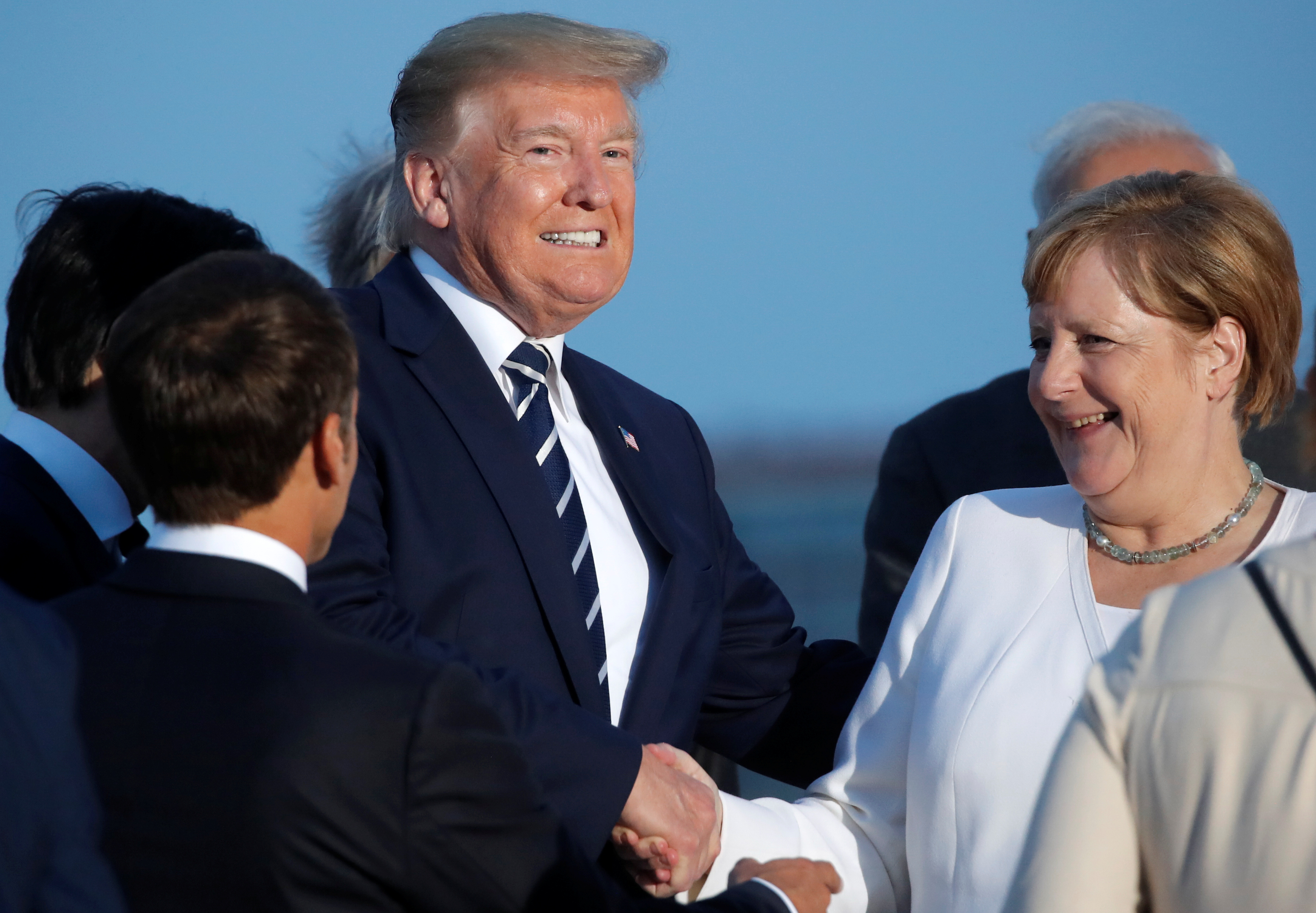 Los cálidos apretones de manos de Trump que solo 'enmascaran' su enfoque en el G7