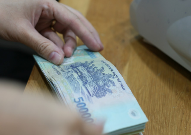 Đã có những ngân hàng giảm lãi suất đầu vào 0,1 - 0,4 điểm % - Ảnh 1.