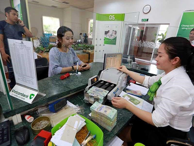Phía sau lợi nhuận khủng của các ngân hàng - Ảnh 1.