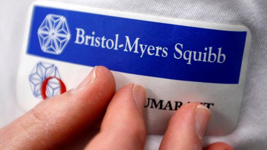 Logo of global biopharmaceutical company Bristol-Myers Squibb is pictured on the blouse of an employee in Le Passage, near Agen, France March 29, 2018.