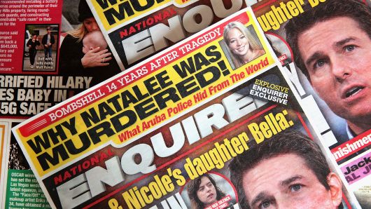 In this photo illustration, celebrity gossip dominates the cover of a National Enquirer magazine on April 11, 2019 in Chicago, Illinois.