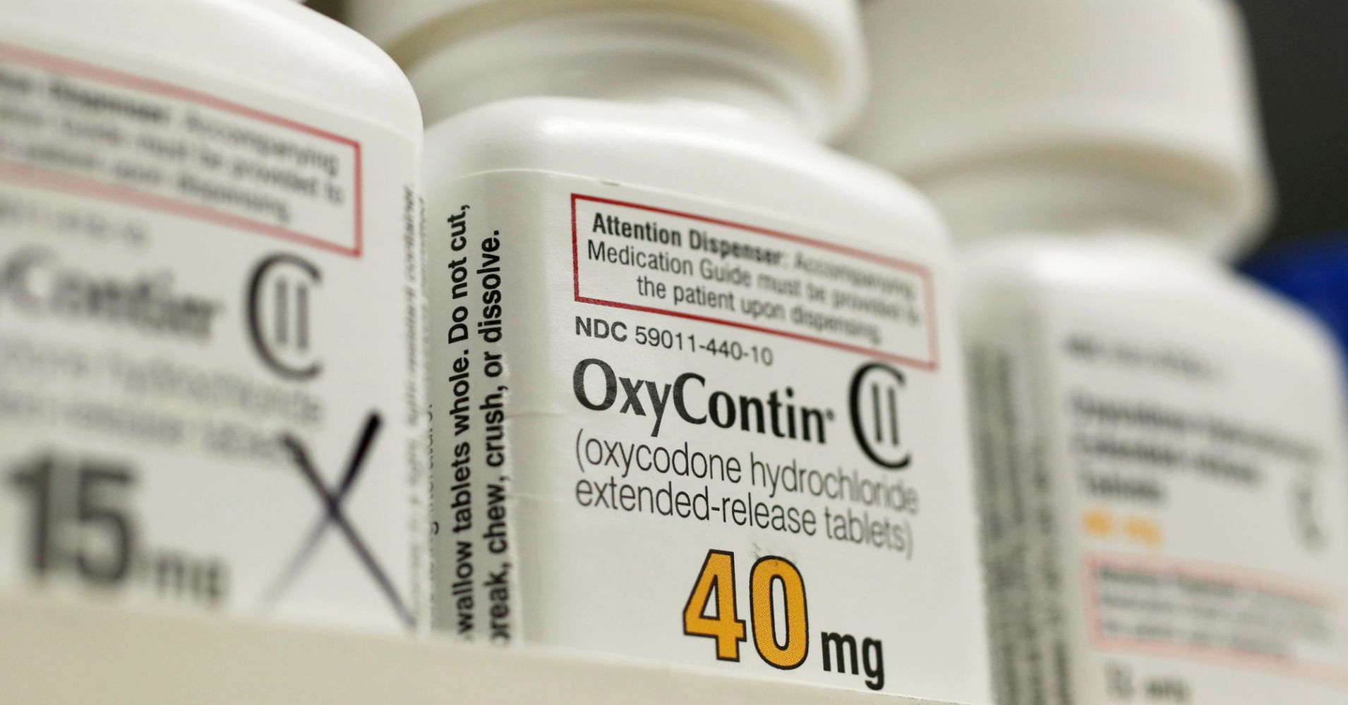Bottles of prescription painkiller OxyContin made by Purdue Pharma LP sit on a shelf at a local pharmacy in Provo, Utah, April 25, 2017.