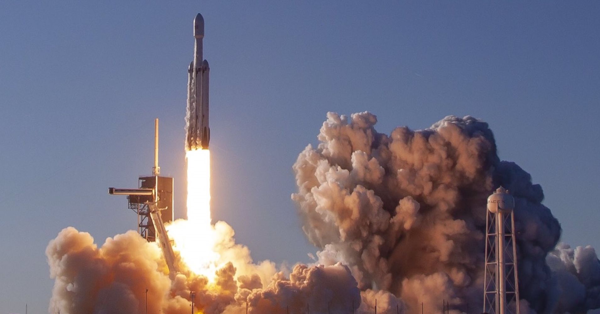 SpaceX launches the Falcon Heavy rocket on its first commercial mission.