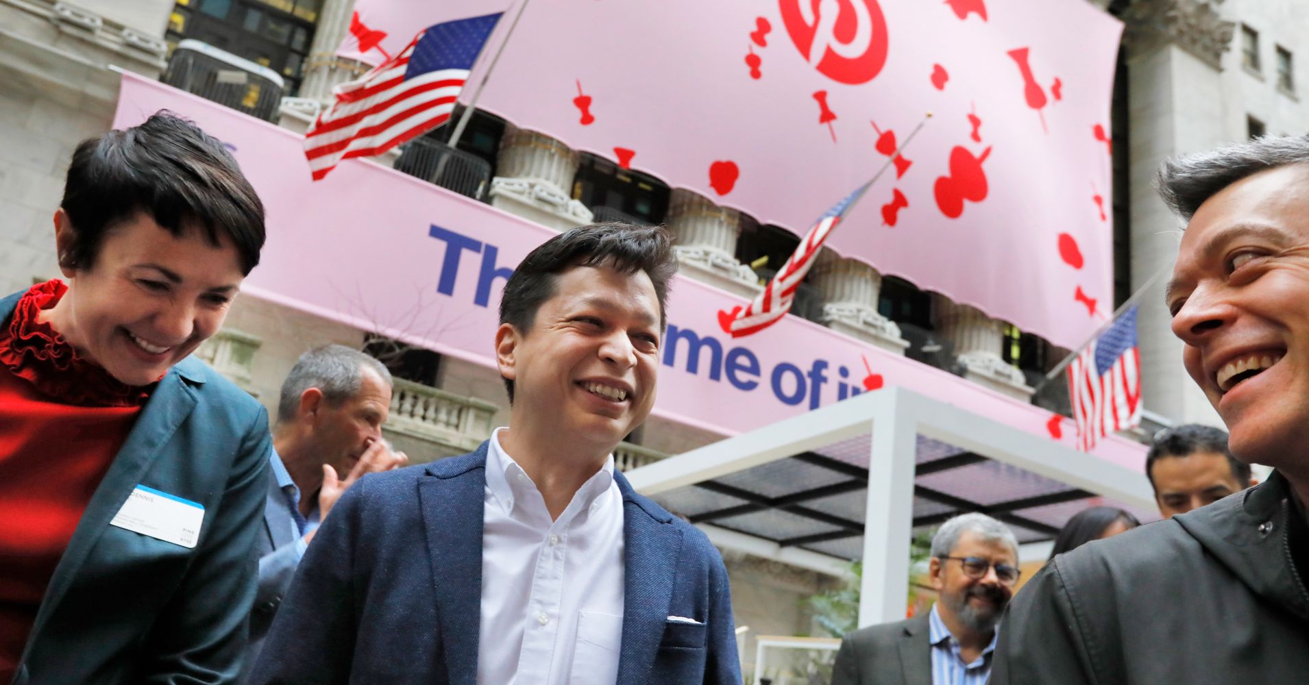 Pinterest co-founder & CEO Ben Silbermann, center, gathers with company employees outside the New York Stock Exchange, Thursday, April 18, 2019, before the Pinterest IPO.