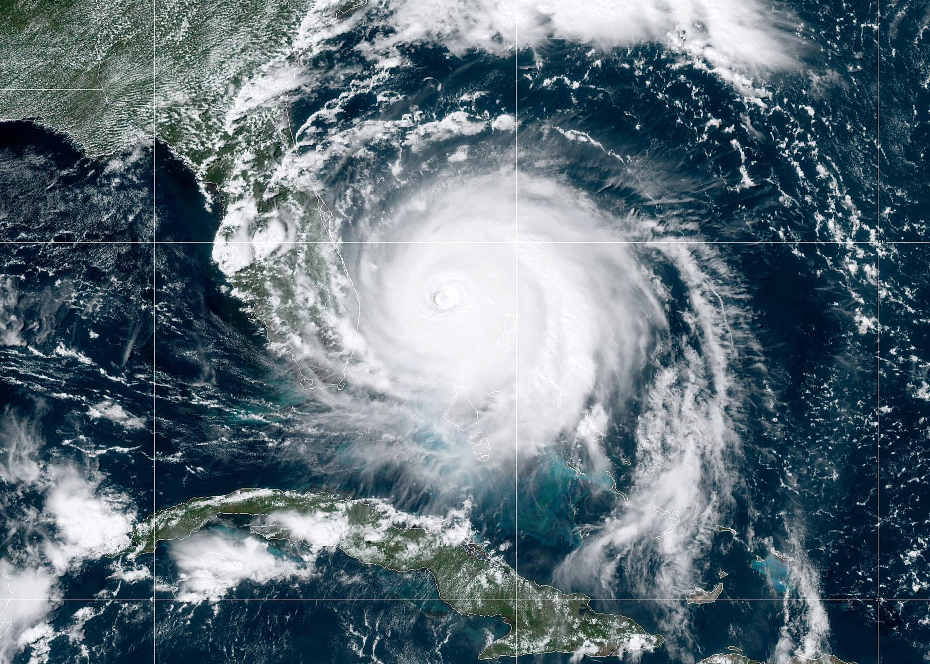 Slow-moving Hurricane Dorian pounds the Bahamas as it inches towards Florida coast