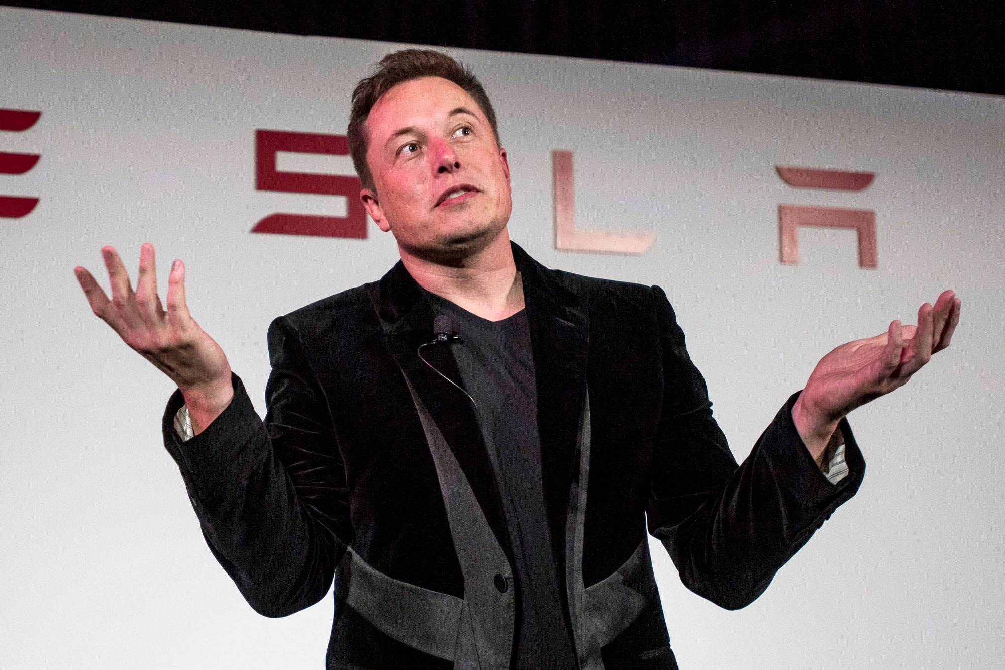 Tesla gives up most of monster one-day pop in wild speculative trading