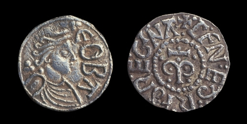 A silver coin depicting a medieval